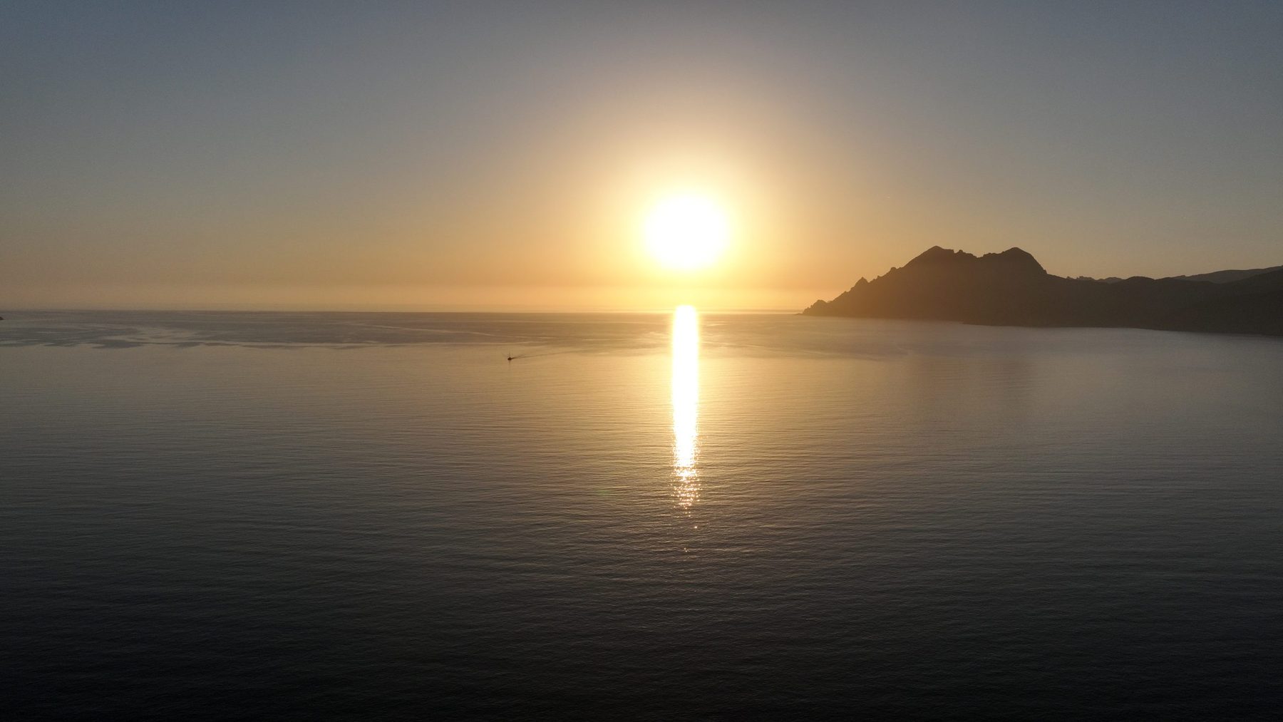 Le coucher de soleil sur le golfe de Porto